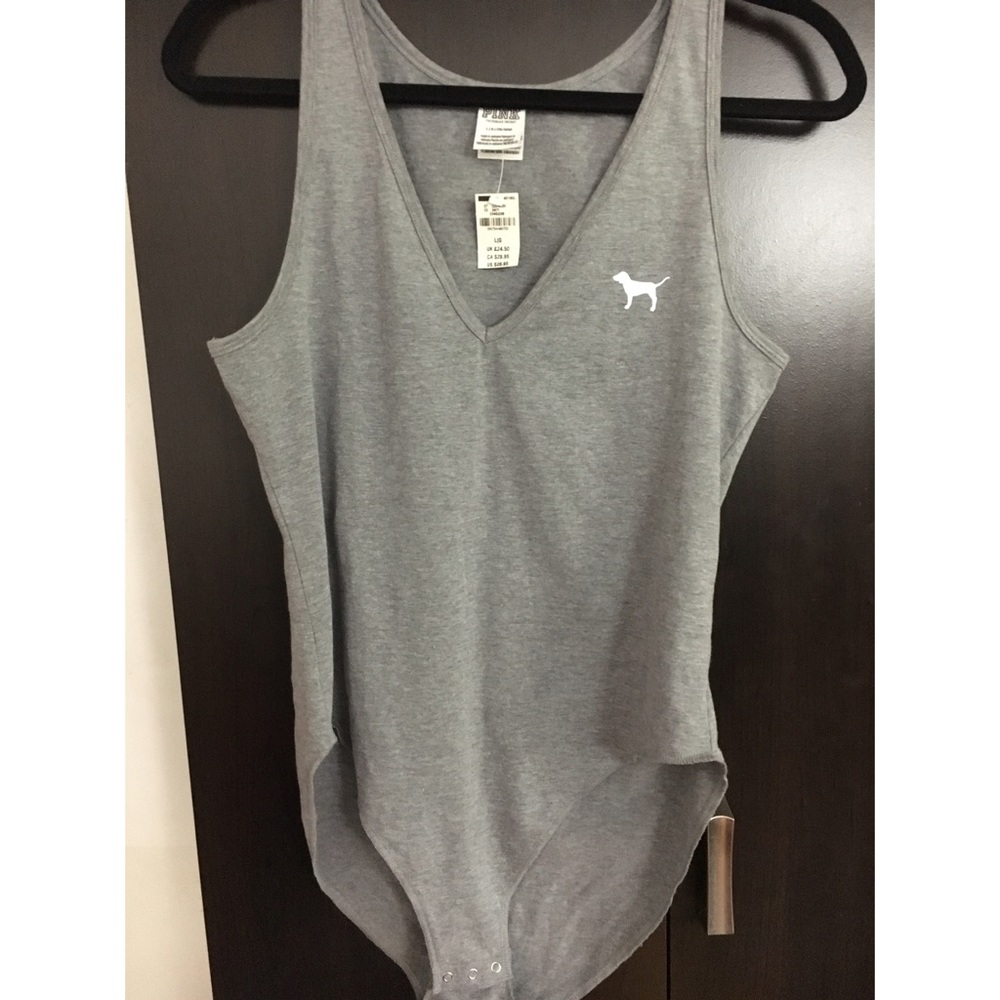 NWT PINK body suit!!